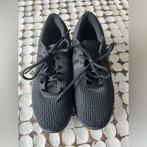 Women’s Nike Revolution 4 Size 7.  Worn once. Excellent condition.